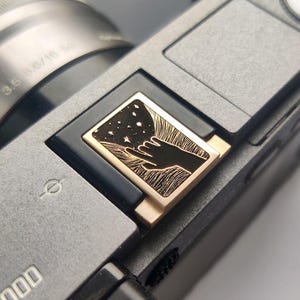 Reaching for the Stars Camera Hot Shoe Cover: Bronze, Leica/Nikon/Sony