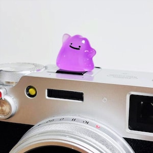 Idem camera flitsschoencover: lichtgevend hars Pokemon-cadeau voor DSLR en spiegelloze camera