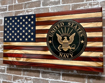 May include: Wooden American flag with a red, white, and blue color scheme. The flag has a navy seal in the center with the words "United States Navy".