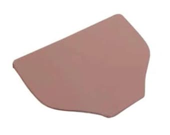 May include: A light pink plastic spatula with a rounded edge and a slightly curved handle.