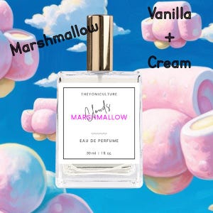 May include: A clear glass perfume bottle with a gold cap, labeled "Marshmallow Clouds Eau de Perfume." The label includes the text "Marshmallow" and "Vanilla + Cream." The bottle contains 1 fl oz of perfume and is set against a blue sky background with marshmallow and cloud illustrations.