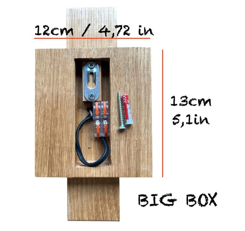 May include: A wooden box with a cutout for electrical wiring. The box is 12 cm by 13 cm and has the words "BIG BOX" written on it.