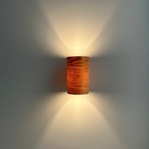 Wall light made of oak wood and natural walnut veneer. Beautiful light. original lamp. amazing light. handmade