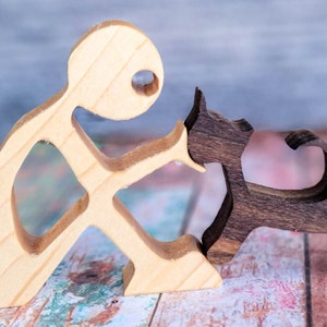 Human and Cat or Dog Wooden Statue