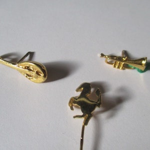 Horse, Trumpet, Guitar pin in silver