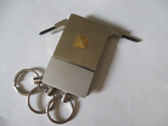 Silver multifunction keyring - image 1