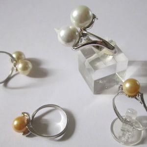 Silver ring with natural pearls