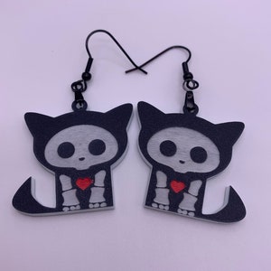 Skeleton cat earrings