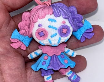 Creepy doll keychain