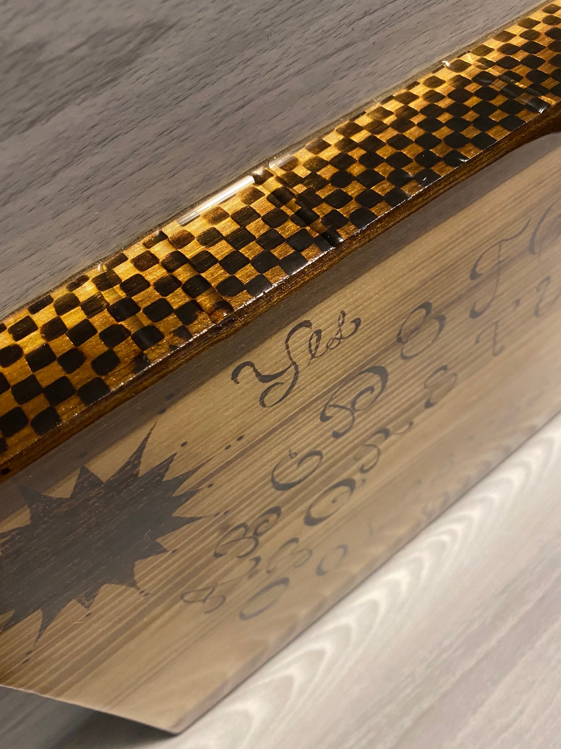 bois brûlé en 6 lettres