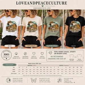Può includere: Quattro magliette bianche, color crema, verde erica e nere, ognuna con una grafica di Snoopy e la scritta "HISTORY BENEATH OUR PAWS". Le magliette sono abbinate a pantaloncini neri. È inclusa anche una tabella delle taglie.