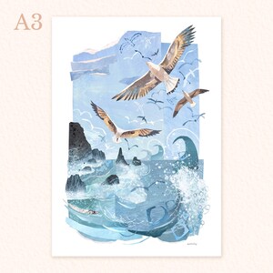 May include: A3 print with a watercolour illustration of seagulls flying above a stormy sea. The artwork shows waves breaking against rocky cliffs, using a blue and white colour scheme. The text "A3" is in the upper left corner.