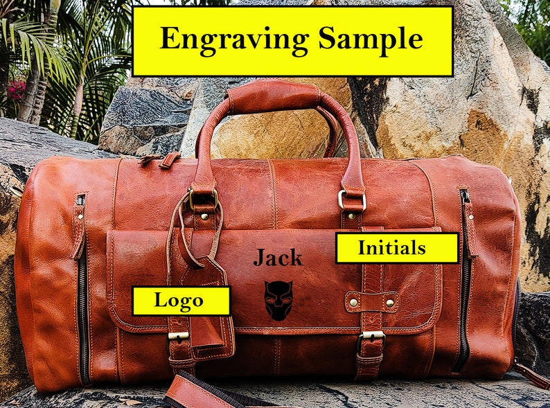 May include: A brown leather duffel bag with a black logo, the name "Jack" and a black panther graphic engraved on the front. The bag also has a tag with the word "Logo" and a strap with the word "Initials" on it.