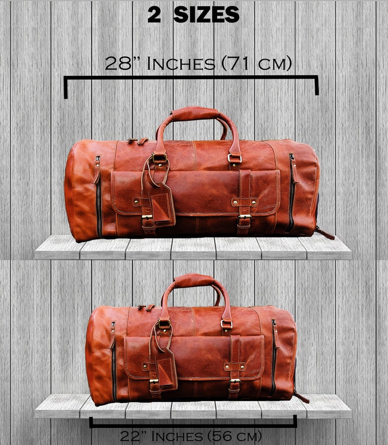 May include: Two brown leather duffel bags on wooden shelves. The larger bag is 28 inches (71 cm) and the smaller bag is 22 inches (56 cm).