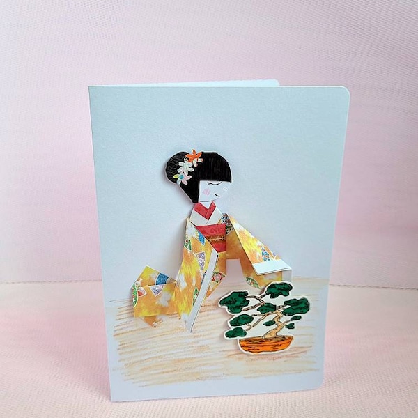 Beautiful origami geisha card, unique greeting card with Japanese geisha in beautiful kimono tending bonsai tree, origami celebration card