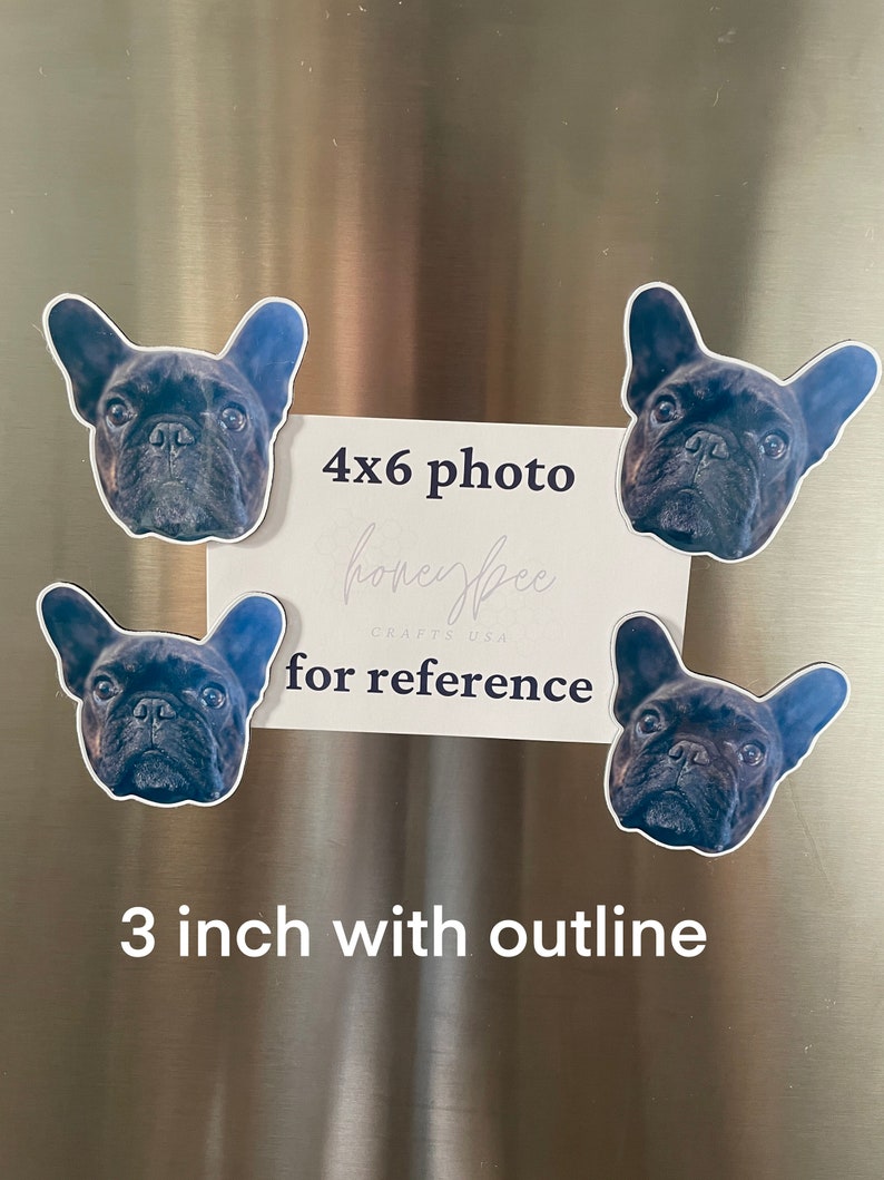 May include: Four black and white French bulldog head images on a stainless steel refrigerator. The images are different sizes. The largest image is labeled "4x6 photo" and the smallest image is labeled "3 inch with outline".