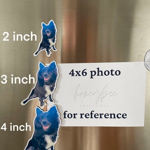 May include: Three black and white dog photo magnets of varying sizes, 2 inches, 3 inches, and 4 inches. The magnets are on a stainless steel refrigerator surface. A 4x6 photo with the text "honeybee crafts USA for reference" is on the refrigerator.