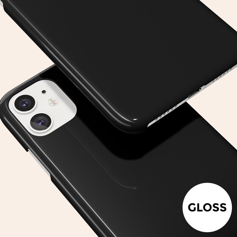 May include: A black phone case with a glossy finish. The case has a camera cutout and the word "GLOSS" is printed on the back.