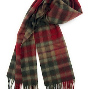 May include: A red and green plaid scarf with fringed ends.