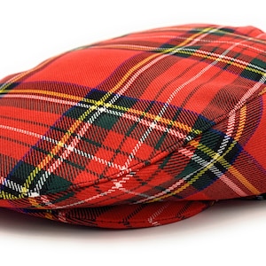 May include: A red, yellow, green and white plaid newsboy cap.