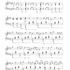 Puede incluir: Una partitura musical para el Concierto para piano No. 1, Op. 23 de P. Tchaikovsky. La música está escrita en notación estándar con claves de sol y de fa. La partitura incluye una indicación de tempo de = 80 y una indicación dinámica de mf.