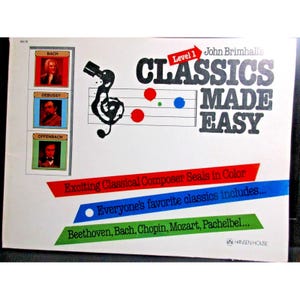 May include: A music book titled John Brimhall's Level 1 Classics Made Easy. The white cover features a black treble clef, colorful dots, and three portrait boxes of Bach, Debussy, and Offenbach. Text includes Exciting Classical Composer Seals in Color and Everyone's favorite classics includes Beethoven, Bach, Chopin, Mozart, Pachelbel.