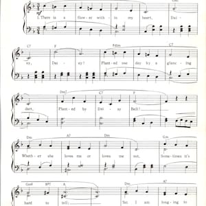 May include: Sheet music for the song "Daisy Bell" (A Bicycle Built For Two) by Harry Dacre. The music is written in standard notation with lyrics printed below each musical staff. The song is a lively waltz tempo.