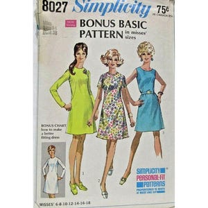 May include: A vintage Simplicity 8027 sewing pattern envelope for a misses' dress in size 16, bust 38. The cover features illustrations of three dresses: a lime green long-sleeve dress, a floral print short-sleeve dress, and a blue sleeveless dress.