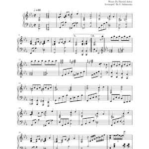 May include: Sheet music for the song "Somewhere Over the Rainbow" from the movie "The Wizard of Oz". The music is written in standard notation with a tempo marking of d=46. The music is arranged for piano.