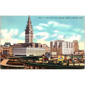 May include: Vintage postcard featuring the New U.S. Post Office and Terminal Tower in Cleveland, Ohio. The image showcases a tall skyscraper and other buildings under a blue sky with clouds. The postcard has a classic, nostalgic aesthetic.
