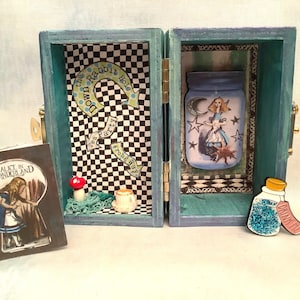 Alice in Wonderland treasure chest with pin and book