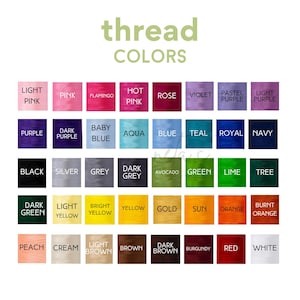 May include: A color chart showing thread colors for embroidery and sewing. The chart includes a variety of colors, including pink, purple, blue, green, yellow, orange, brown, red, and white.
