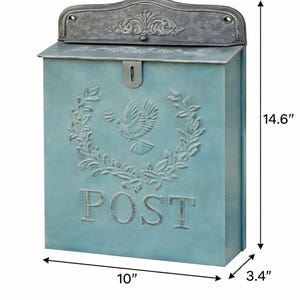 May include: A blue mailbox with a decorative dove and wreath design. The mailbox is 10 inches wide, 3.4 inches deep, and 14.6 inches tall. The word "POST" is embossed on the front.