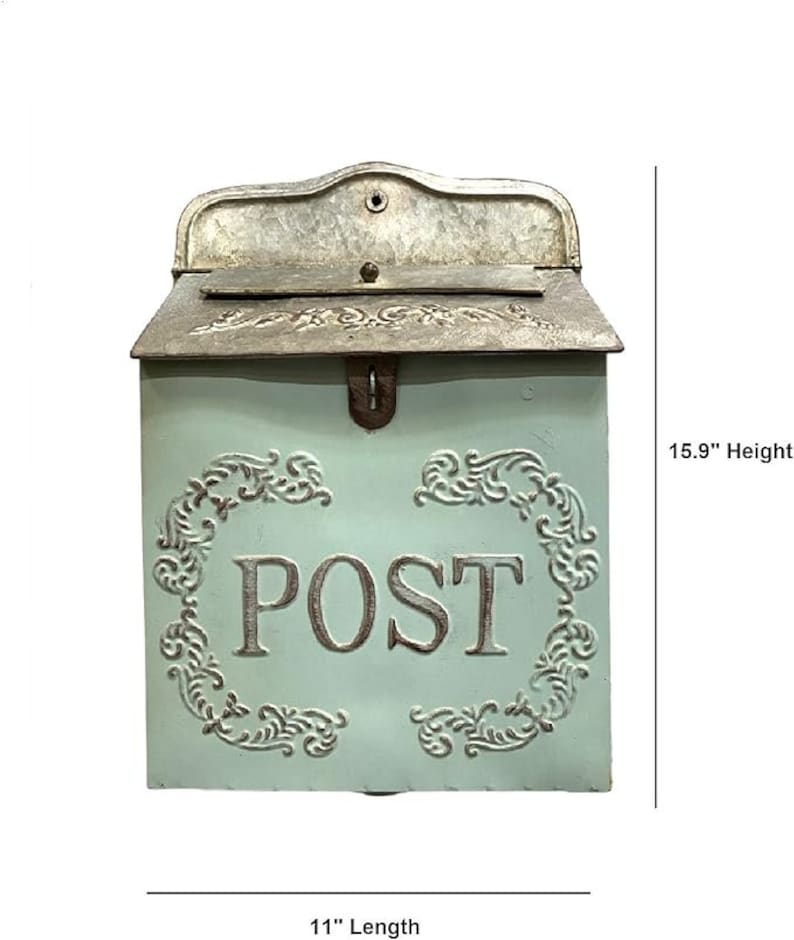 May include: A light green metal wall-mounted mailbox with a galvanized silver top lid. The front features the embossed word POST surrounded by decorative scrollwork. It measures 15.9 inches in height and 11 inches in length as indicated.
