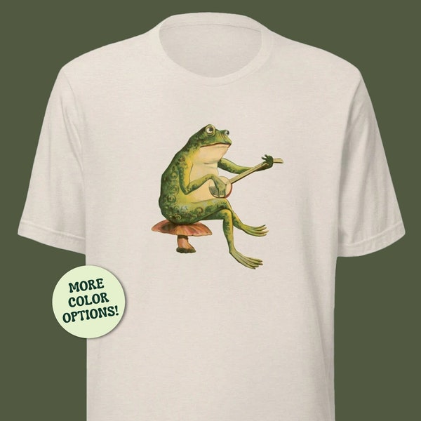 Cute Frog Playing Banjo Unisex T-Shirt, Phorg Sitting on Mushroom, Cottagecore Toad, Goblincore Froge, Playing Guitar On Fungi, Gift For Her