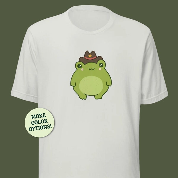 Cute Frog Cowboy Hat Unisex T-Shirt, Kawaii Cottagecore Rospo Estetico, Chubby Wild West Froge, Funny Western Rodeo Phorg, Distintivo dello Sceriffo