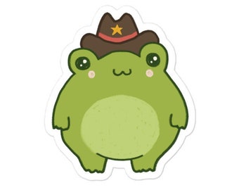 Grenouille mignonne avec vieux chapeau de cowboy - crapaud esthétique kawaii cottagecore - grenouille potelée du Far West - phog rond a écusson de shérif - stickers rigolos