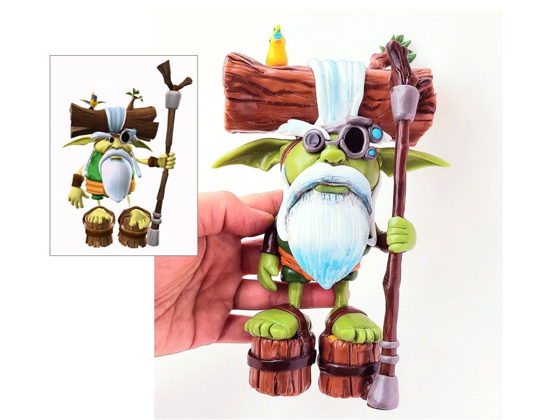 May include: A green and white gnome figurine with a long white beard, wearing a green and brown outfit, holding a wooden staff. The gnome is wearing a pair of goggles and has a log on its head. The gnome is standing on two wooden barrels.