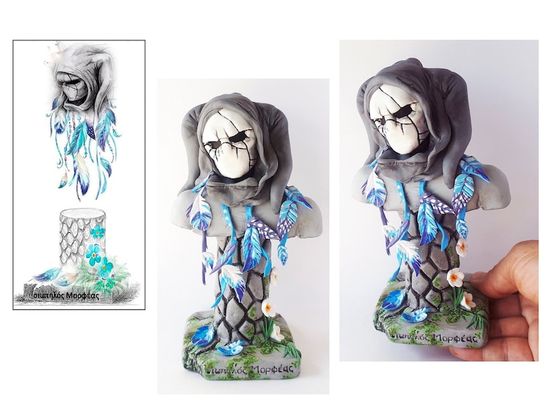May include: A grey and white ceramic bust of a hooded figure with a skull-like face. The bust is decorated with blue and white feathers and flowers. The base of the bust is made of grey stone and has the words "&Theta;&upsilon;&mu;&eta;&theta;&epsilon;ί&sigmaf; &Mu;&omicron;&rho;&phi;έ&sigmaf;" written on it.