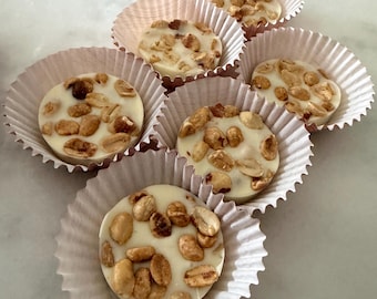 12 racimos de cacahuetes con chocolate blanco, negro o con leche