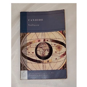 May include: A blue and white paperback book titled "CANDIDE" by Voltaire. The cover features an illustration of a globe surrounded by a ring of planets.