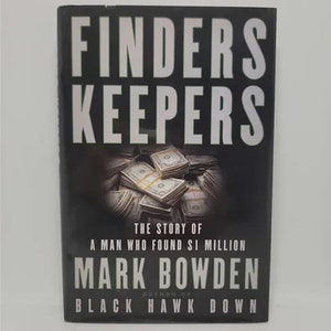 May include: A black hardcover book titled "Finders Keepers: The Story of a Man Who Found $1 Million" by Mark Bowden, author of "Black Hawk Down".