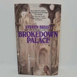 May include: A book cover with a purple and white title "BROKEDOWN PALACE" by Steven Brust, author of Jhereg and Yendi. The cover features a dark, gothic-style illustration of a building with a figure in white standing in the doorway.