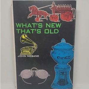 May include: A book cover with the title "WHAT'S NEW THAT'S OLD" in green text. The cover features illustrations of a horse-drawn carriage, a gramophone, sunglasses, and a Coca-Cola dispenser, all in a vintage style. The author's name, John Mebane, is also visible.