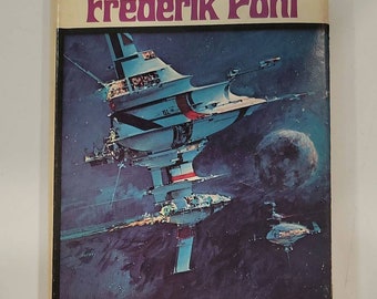 May include: A vintage paperback book cover featuring a colorful illustration of a futuristic spaceship in space. The book title is "The best of Frederik Pohl" and the book is edited by Lester del Rey.