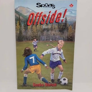 May include: A book cover with a red title "Offside!" and a picture of two girls playing soccer. The book is part of the "Sports Stories" series.
