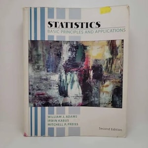 May include: A book titled "Statistics: Basic Principles and Applications" by William J. Adams, Irwin Kabus, and Mitchell P. Preiss. The book is a second edition and features an abstract painting on the cover.