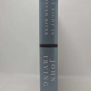Last Night in Twisted River: A Novel Hardcover Deckle Edge, October 27, 2009 by John Irving In 1954, in the cookhouse of a logging an image 2