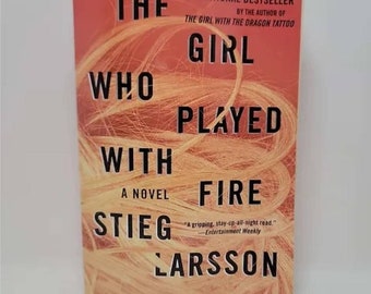 The Girl Who Played with Fire: A Lisbeth Salander Novel (The Girl with the Dragon Tattoo Series) Mass Market Paperback – Illustrated, Novemb
