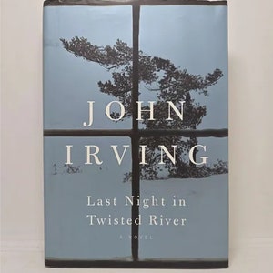 Last Night in Twisted River: A Novel Hardcover Deckle Edge, October 27, 2009 by John Irving In 1954, in the cookhouse of a logging an image 1
